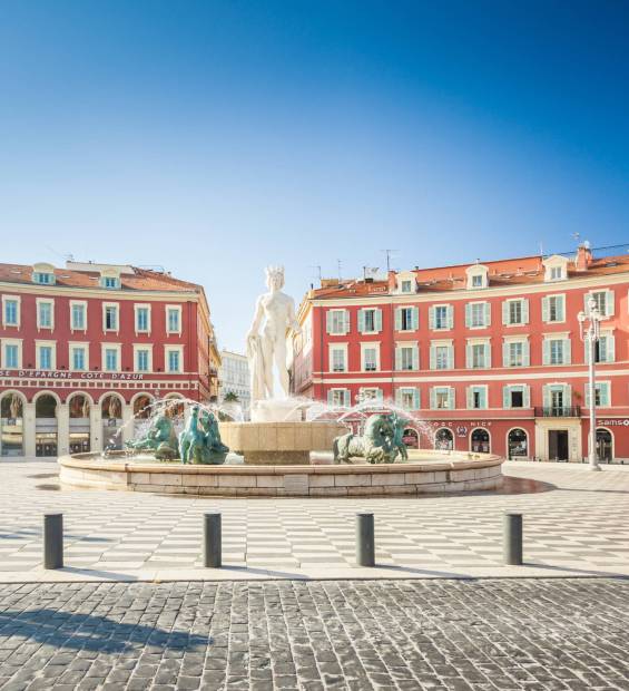 Nice, France - Aug 1, 2021: Apollo statue as a Fontaine du Soleil on Place Massena in Nice France, French riviera